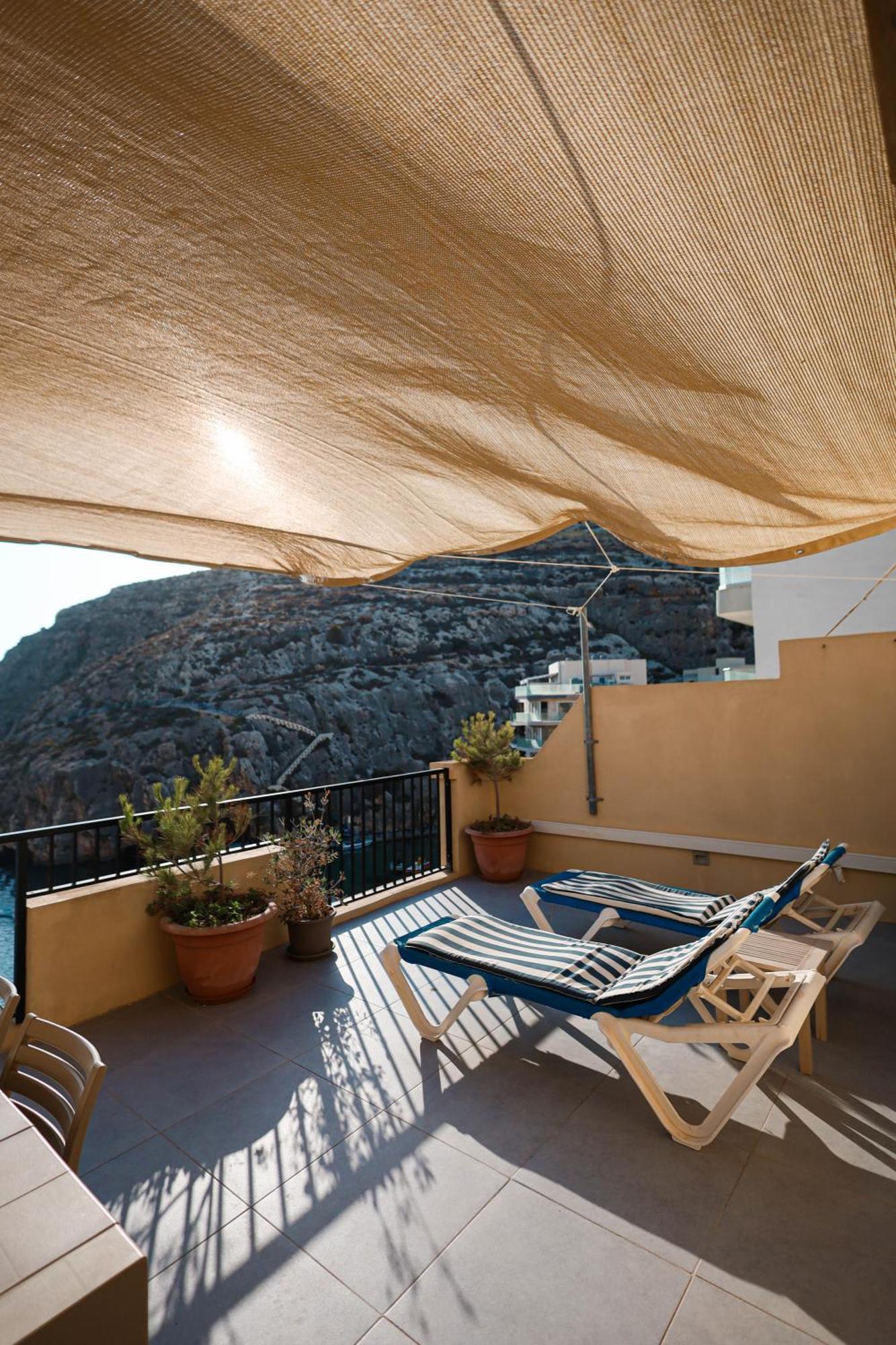Seafront Duplex Penthouse With Terrace Overlooking Xlendi Bay Esterno foto